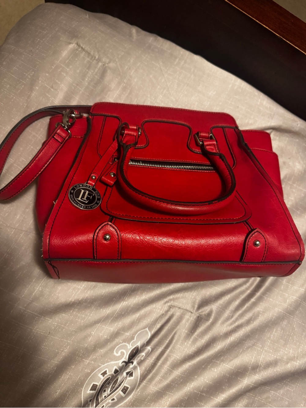 London Fog Red Leather Satchel with Black Trim and Logo Medallion